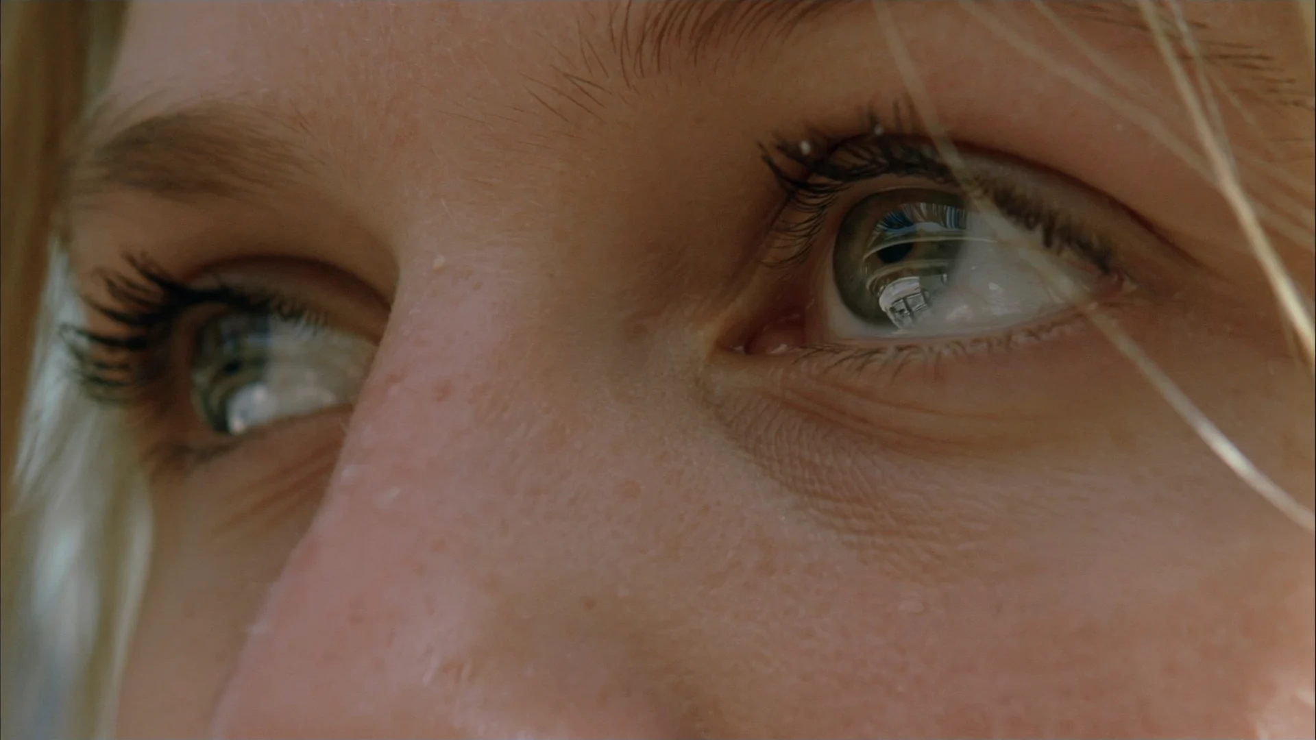 Extreme close-up of an eye in cinematic light