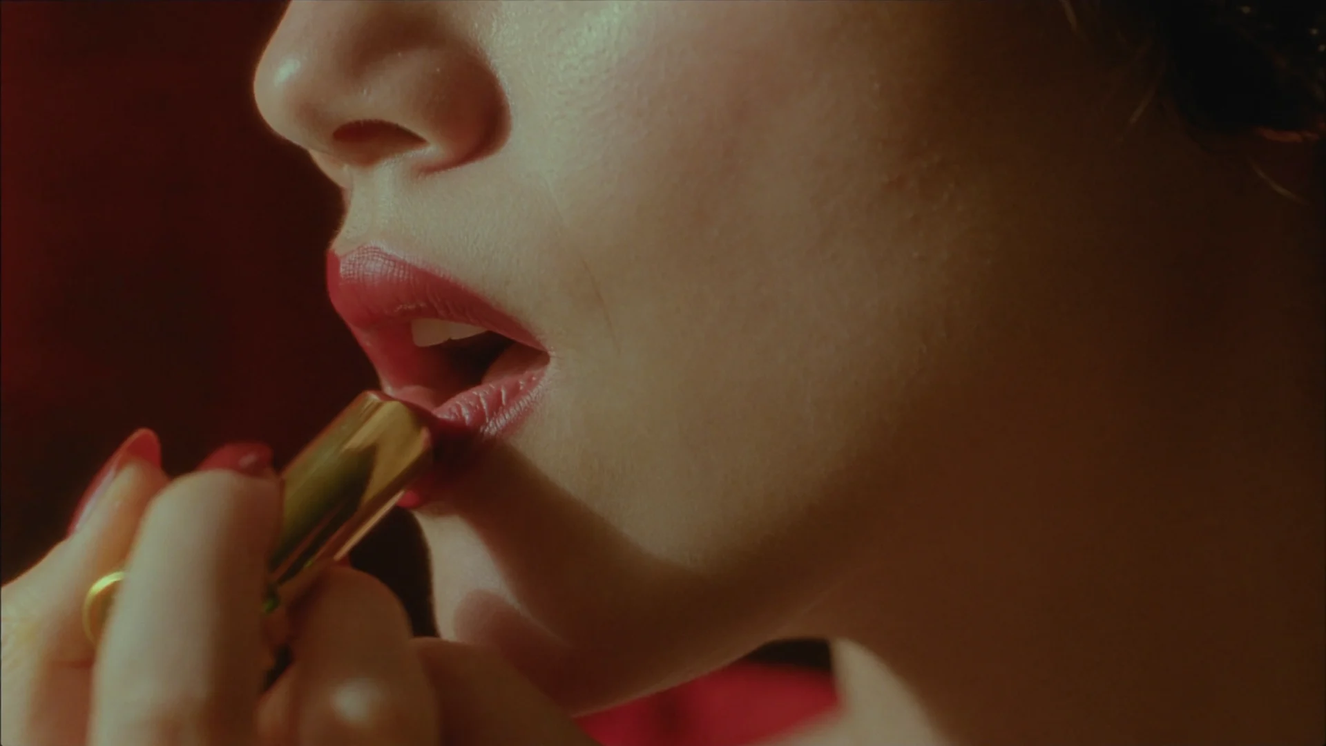 Macro close-up of lips with a red palette